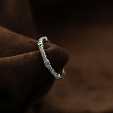"Timeless Grace: The Perfect Band Ring for Her"