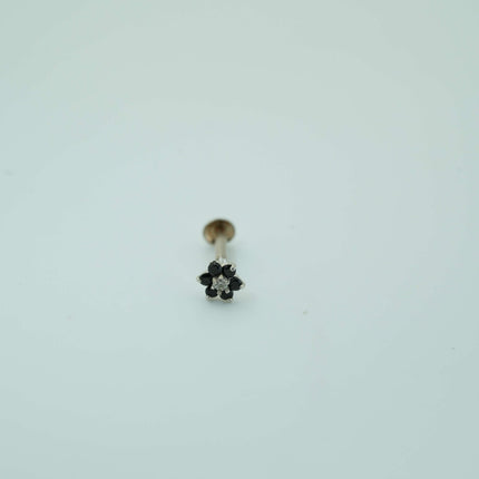 "Elegant Contrast: Silver Nosepin with a Striking Black Stone and White Center"