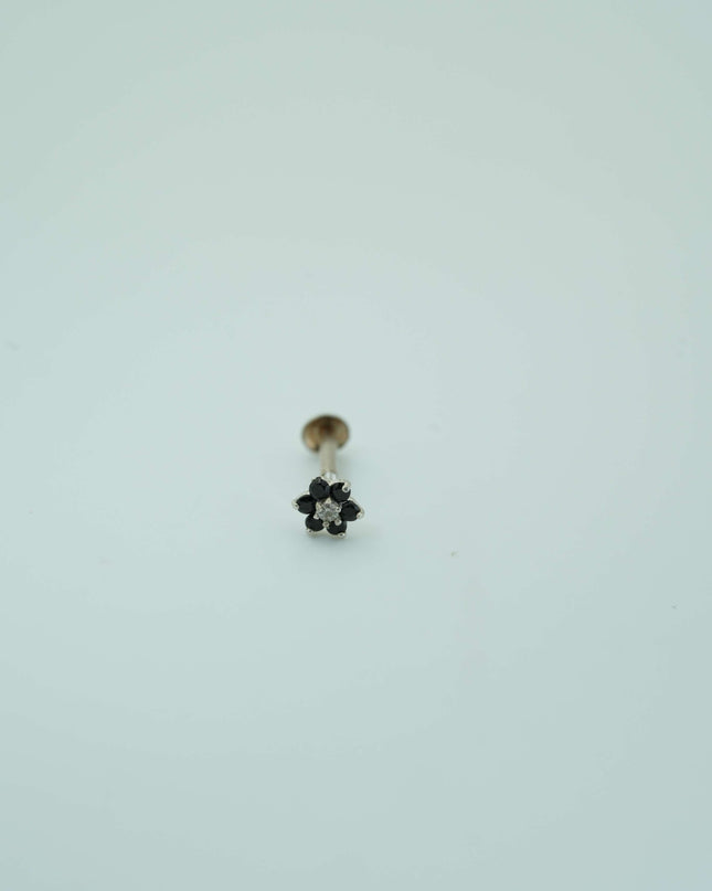 "Elegant Contrast: Silver Nosepin with a Striking Black Stone and White Center"