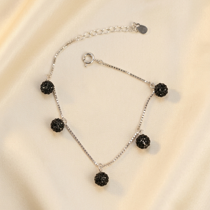Silver Bracelet with Black Charms – Simple and Stylish