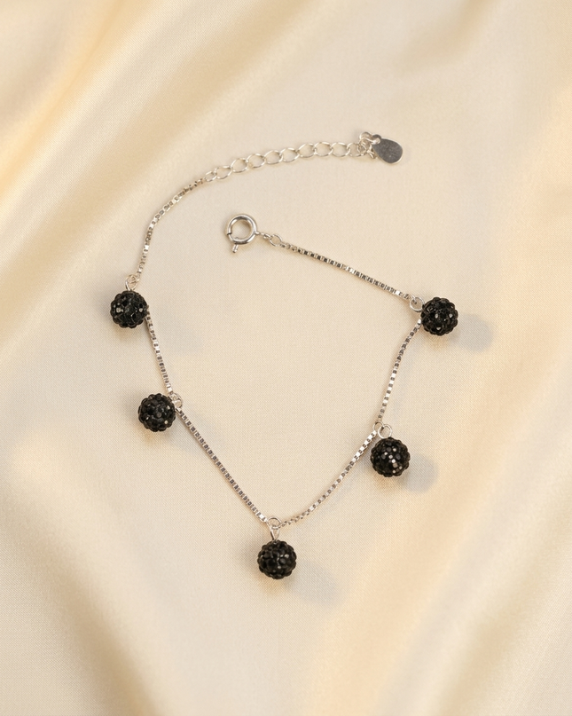 Silver Bracelet with Black Charms – Simple and Stylish