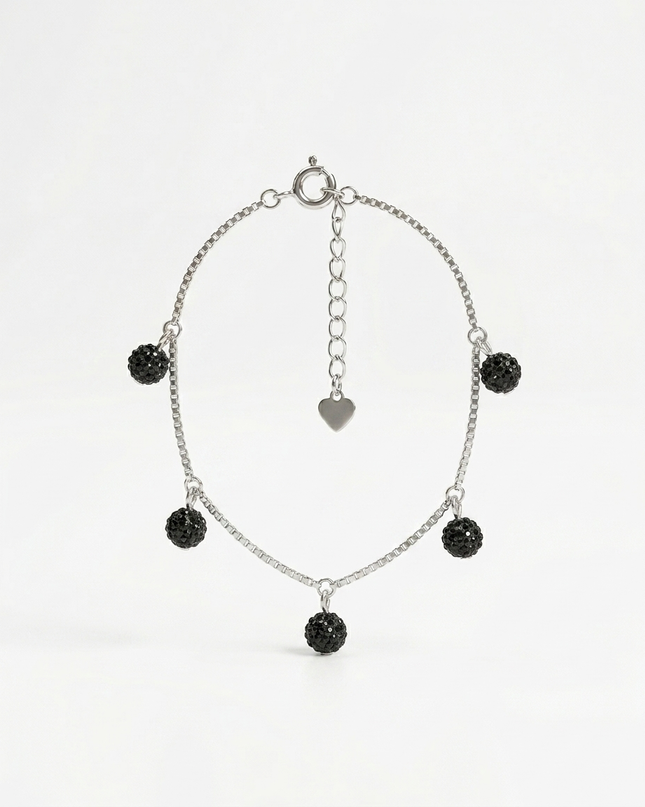 Silver Bracelet with Black Charms – Simple and Stylish