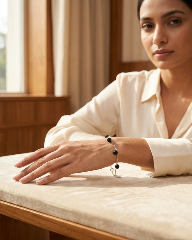 Silver Bracelet with Black Charms – Simple and Stylish