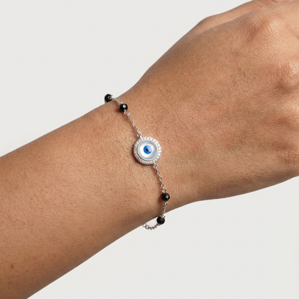 Protection in Style Embrace the Silver Evil Eye Bracelet.