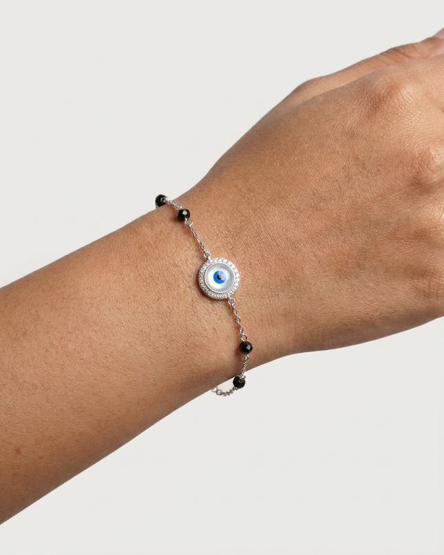 Protection in Style Embrace the Silver Evil Eye Bracelet.