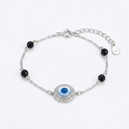 Protection in Style Embrace the Silver Evil Eye Bracelet.
