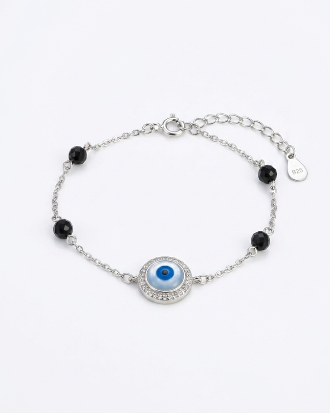 Protection in Style Embrace the Silver Evil Eye Bracelet.