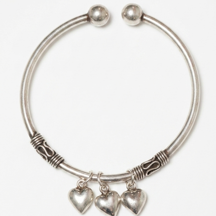 "Silver Oxidized Kada with Heart Charms – Timeless Elegance with a Rustic Touch"