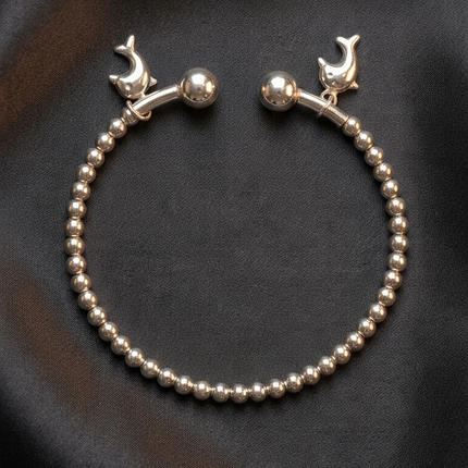 Dolphin Charm – Playful Elegance, Unique Design"